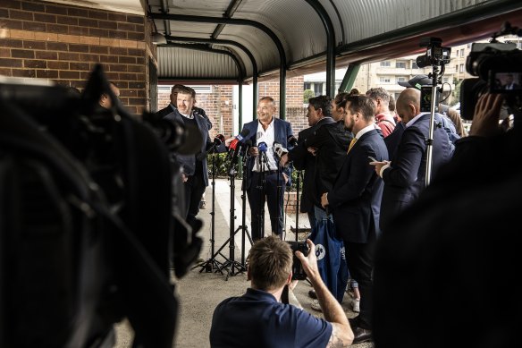 Eddie Jones fields questions from reporters at Coogee Oval.