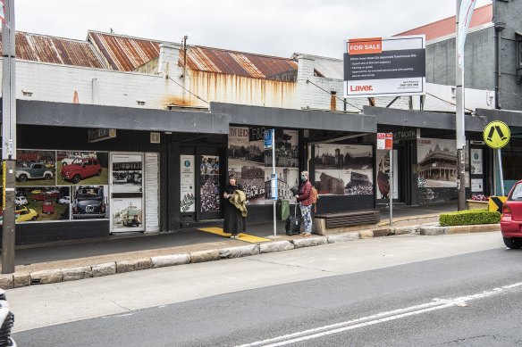The four lots on Norton Street in Leichhardt, which have been vacant for years, are now up for sale with an approved DA.