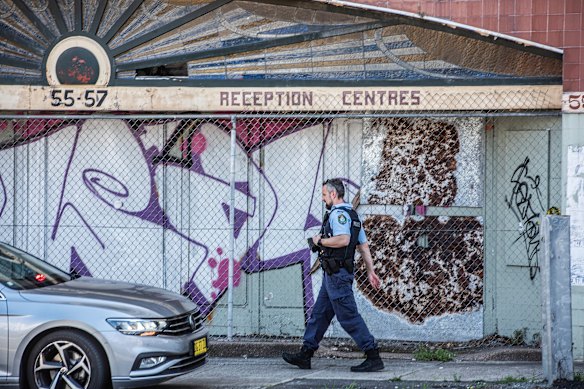 Police investigate after the Homebush Theatre was set alight overnight.