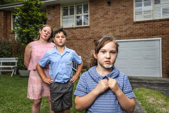 Debbie Levien with her children Oliver and Emilia, who have had a “stressful” week dealing with the uncertainty of changing catchments. 