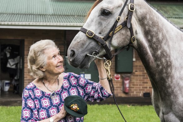Daphne Benaud with late husband Richie’s baggy green cap and Caulfield Cup contender Benaud.