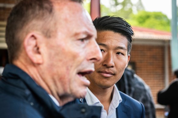 Liberal candidate Scott Yung with former prime minister Tony Abbott in Bennelong on Saturday.