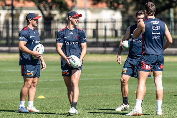 Daly Cherry-Evans, Victor Radley and Hugo Savala share a laugh at training.