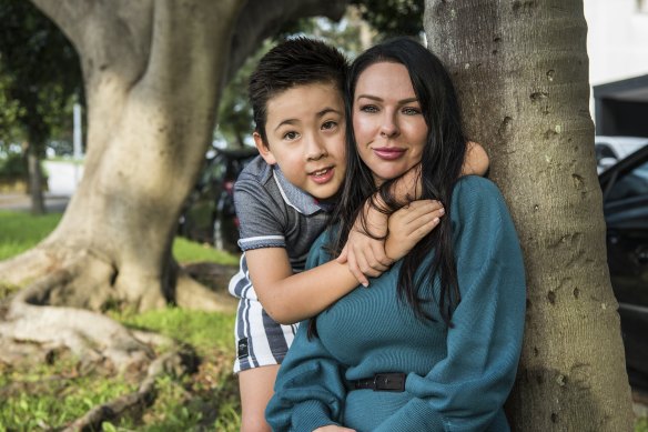 Nicole Finch and her son, Hunter, 7.