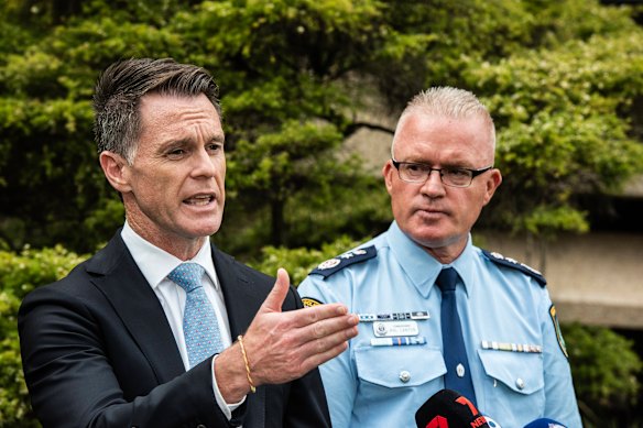 Premier Chris Minns alongside NSW Police Commissioner Mal Lanyon on Tuesday.