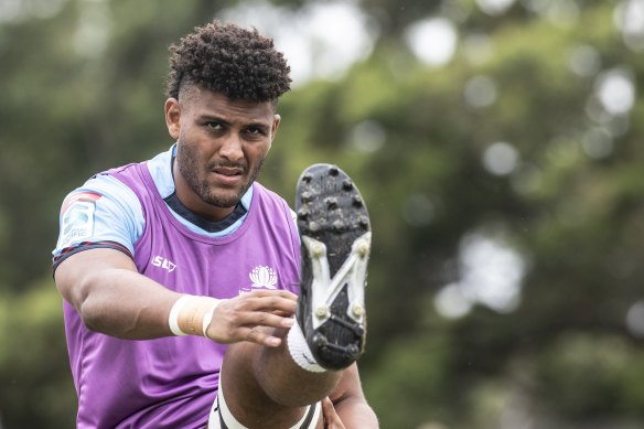 Miles Amatosero limbering up for  Waratahs training in Sydney.
