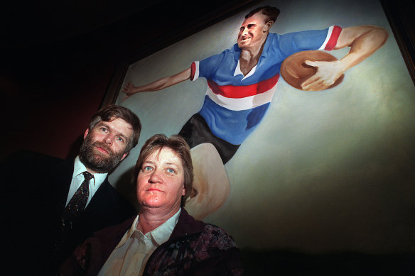 Dennis Galimberti with Chatfield in 2004, under a mural of Footscray great Charlie Sutton.