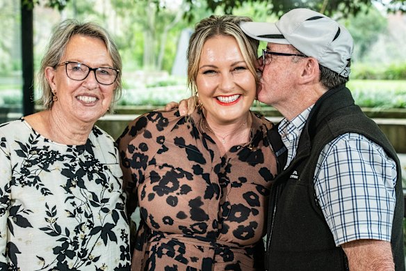 Lauren Huxley’s sister, Simone, and parents Christine and Patrick Huxley celebrate outside the NSW Parole Authority on Thursday.