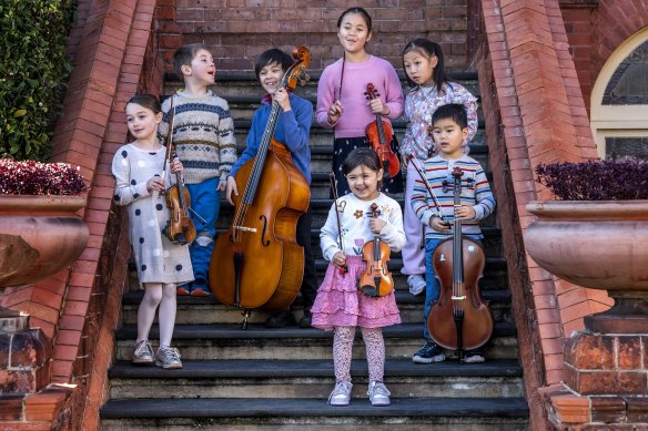 Kids playing in the Sydney Youth Orchestras at Santa Sabina College Strathfield, from left, Charlotte Gresham, Dylan Chappel, Xander Brennan, Patricia Mundine, Madeleine Vohland, Ava Tu and Joshua Ahn.