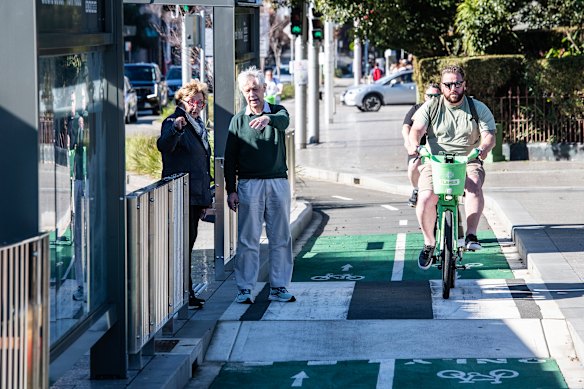 Kathryn Greiner and Michael Waterhouse allege the Oxford Street cycleway discriminates against the elderly and the disabled because it will use seven “floating” bus stops. Pedestrians will need to cross the bike lane to catch a bus.