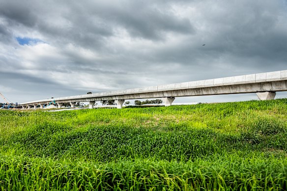 A viaduct for the airport metro line cuts through paddocks near the Luddenham station.