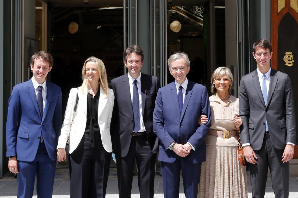 Head of French multinational corporation LVMH Bernard Arnault (centre)   and his wife Helene (2R),   with their children (from left) Frederic Arnault, Delphine Arnault, Antoine Arnault and Alexandre Arnault. 