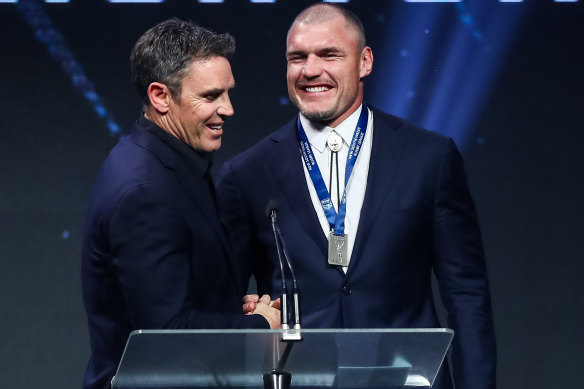 Brad Fittler presents the medal named after him to Angus Crichton.