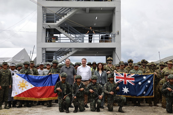 Australian Defence Minister Richard Marles (centre) with Philippine National Defence Secretary Gilberto Teodoro jnr (centre left), Australian ambassador to the Philippines Hae Kyong Yu (centre right), and soldiers before the drills.