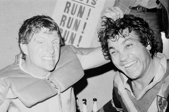 Eastern Suburbs stars Ron Coote (left) and Arthur Beetson share the joys of victory in the dressing room after the 1975 grand final between Easts and St George.