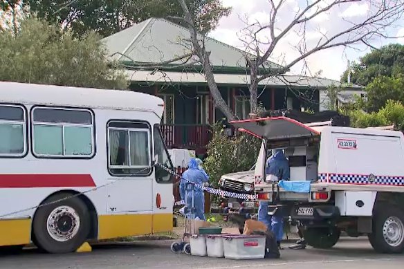 A forensic team looks for clues at Pheobe Bishop’s Gin Gin home.