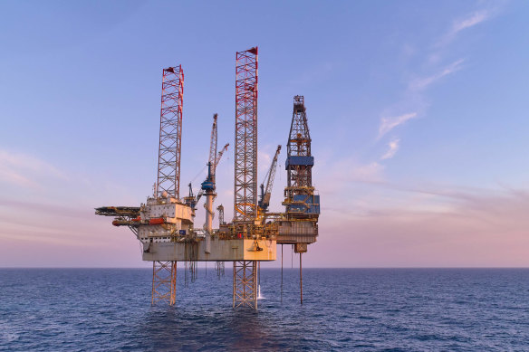 Sources say the government is preparing to raise $3 billion more over the next four years from a tax on offshore gas projects. 