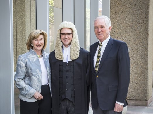 Taking silk: Sandy Dawson with parent Jane and Sandy Dawson in 2016.