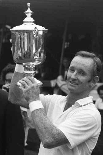 Rod Laver with the US Open trophy in 1969, having won his second Grand Slam - a feat never equalled.


