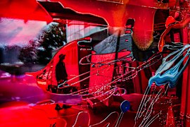 Artist Matthew Cook reflected in the work of Sulman prize entry by Vicki Lee.