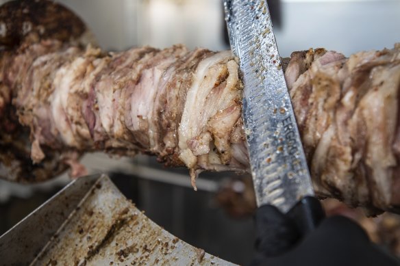 The pork gyros is cooked over charcoal. 