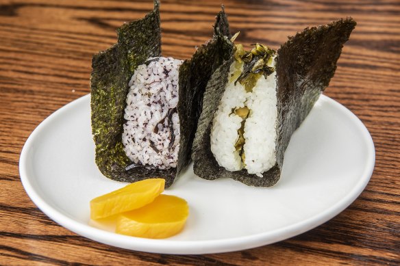 Onigiri with shiso leaf (left) and takana (mustard greens) at Domo 39.