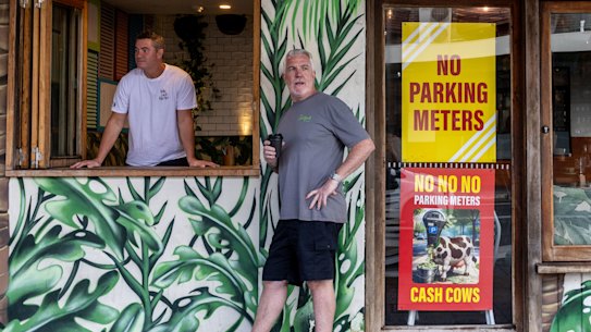 Coogee business owners Brenton McHatton and Dave Martin are among locals fighting the plans for paid meters at seven eastern suburbs beaches.