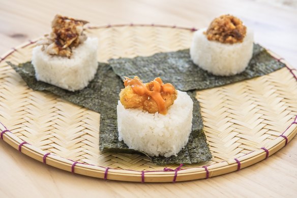 Pork, teriyaki chicken and prawn tempura onigiri.
