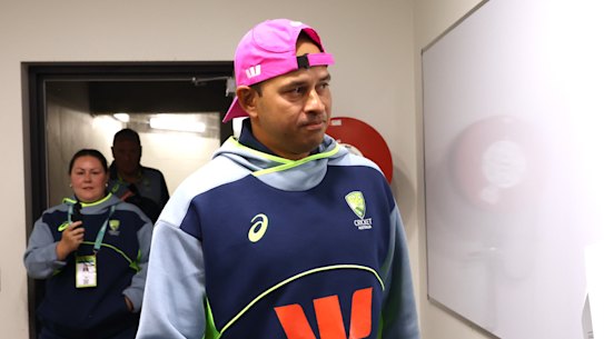 Khawaja arrives at his retirement press conference.