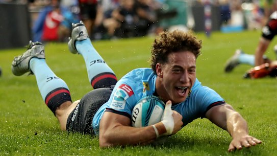 Mark Nawaqanitawase crosses for the Tahs.