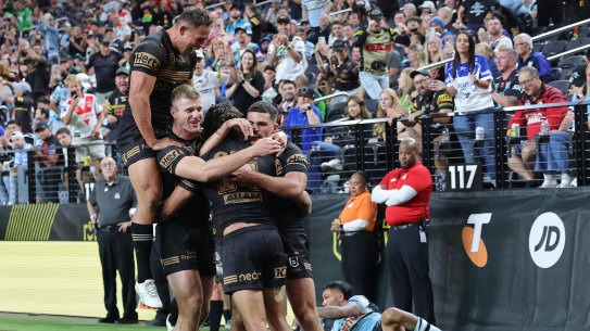 Penrith celebrate Daine Laurie’s match-winning try.