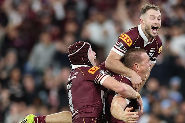 Harry Grant and Sam Walker celebrate Lindsay Collins’ try.