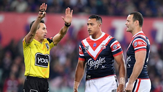 Referee Gerard Sutton sends Roosters forward Siua Taukeiaho to the sin bin last year.