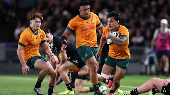 Len Ikitau of Australia charges forward