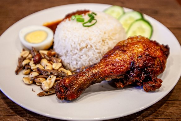 Nasi lemak with fried chicken. 