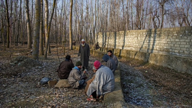 Villagers drink tea Kashmir's northern district of Bandipora.