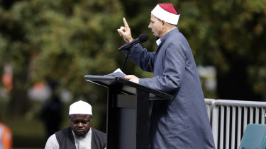 Imam Gamal Fouda addresses Friday prayers at Hagley Park in Christchurch a week after the massacre.