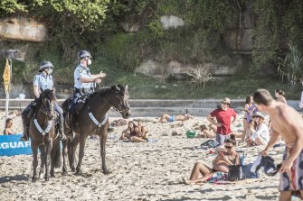 New South Wales police patrol Bondi Beach on Saturday as part of keeping COVID-19 restrictions in place.
