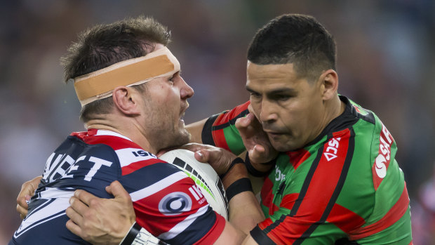 Former Rabbitoh Angus Crichton is tackled by Cody Walker.