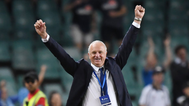 Golden era: Graham Arnold raises his arms in triumph after Sydney FC's FFA Cup win in 2017. 