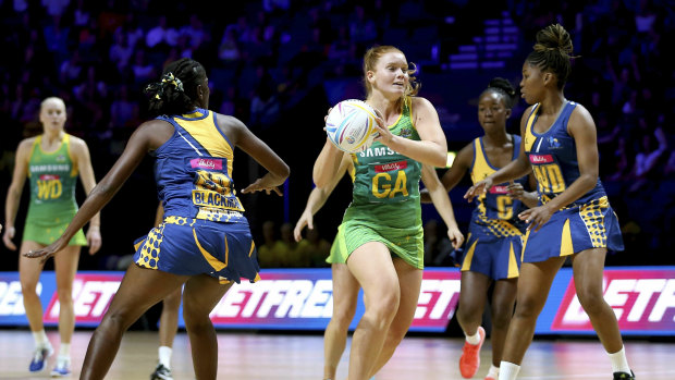 Steph Wood (centre) in action for Australia against Barbados at the 2019 Netball World Cup in Liverpool. 
