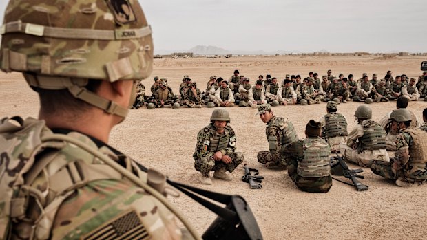 US Army soldiers oversee training of Afghan National Army soldiers at Camp Bastion, Helmand Province, Afghanistan.