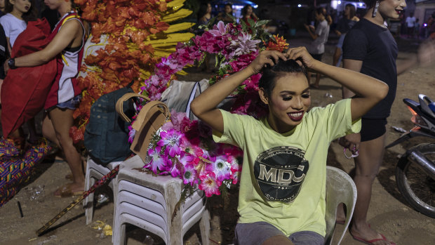 Contestant Jayriez Lee returns to more casual attire after an annual transgender beauty pageant in Maria Respondo, Philippines.
