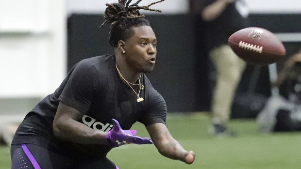 Shaquem Griffin catches a pass during a drill.