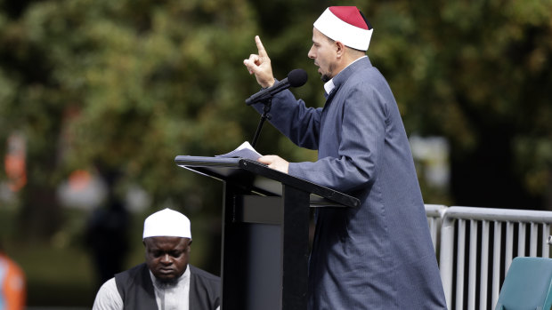 Imam Gamal Fouda addresses Friday prayers at Hagley Park in Christchurch a week after the massacre.