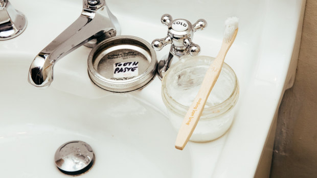 Dianna Cohen's bamboo toothbrush and homemade toothpaste.