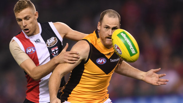 Rough and ready: Back in action for Hawthorn, veteran Jarryd Roughhead takes on Callum Wilke during the round 4 loss to St Kilda at Marvel Stadium.