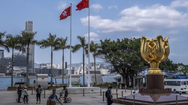 Golden Bauhinia Square, in Wan Chai area of Hong Kong. Setting a confrontational tone ahead of meetings in Alaska, the United States punished Chinese officials involved in eroding democracy in Hong Kong. 