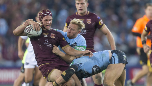 He's back: Kalyn Ponga in action for the Maroons last year . . . this time he's in a more familiar role.
