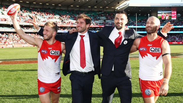 Retiring Swans Kieren Jack, Nick Smith, Heath Grundy and Jarrad McVeigh during a lap of honour after Saturday's match.